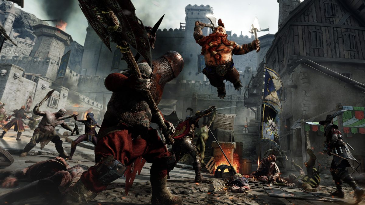 A dwarf jumping at an enemy in Vermintide 2.