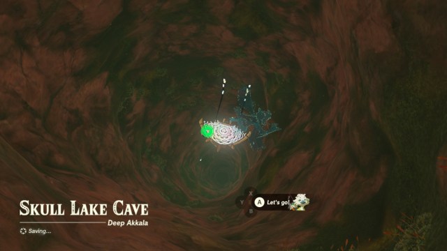 Link paragliding into Skull Lake Cave in The Legend of Zelda: Tears of the Kingdom.