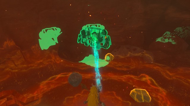 Link using Ultrahand on a mine cart in East Restaurant Cave in The Legend of Zelda: Tears of the Kingdom.