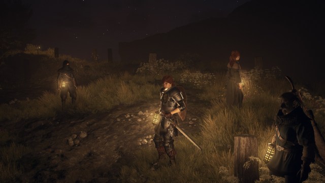 Pawns in Dragon's Dogma 2 at night using Lanterns