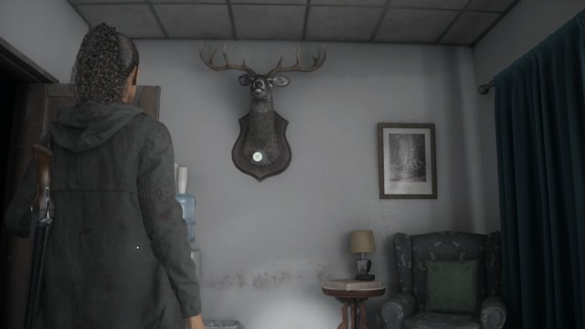 Suomi Hall deer head in Alan Wake 2. 