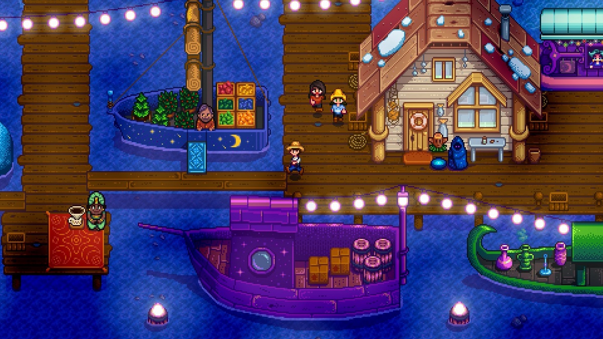 Stardew Valley: the night market on the docks brightly lit.