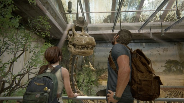Ellie and Joel throwing a hat onto a dinosaur skeleton.