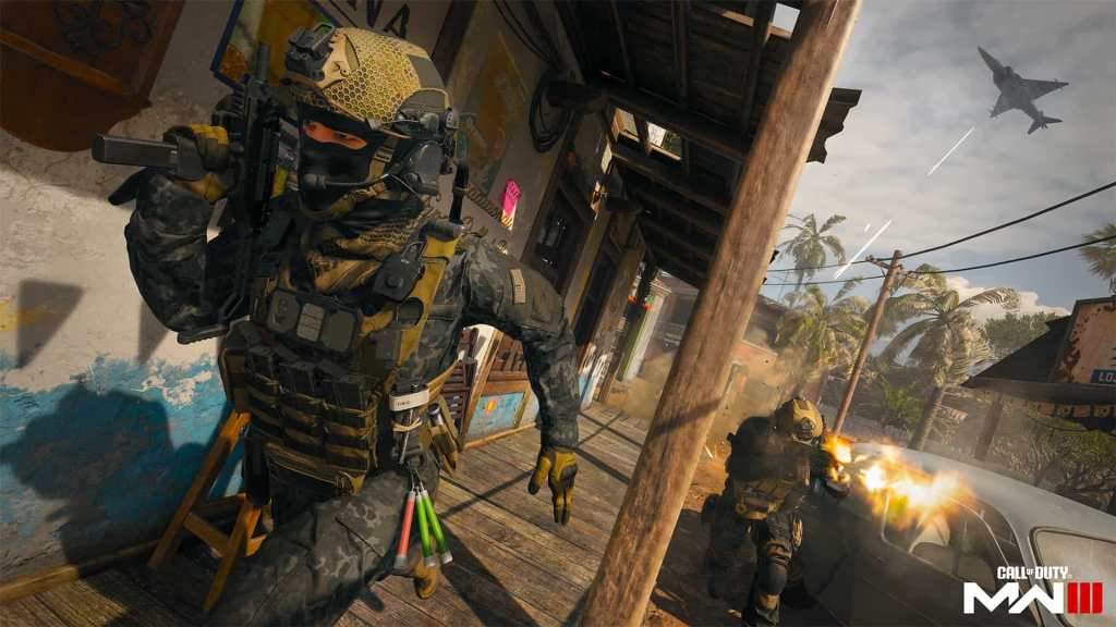 An MW3 player running towards the camera, while a second player fires their weapon. 