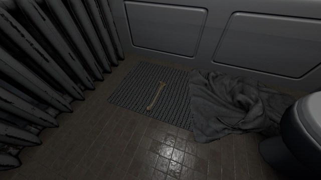 Phasmophobia: a bone lying on the floor in a bathroom.