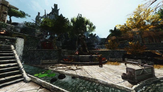 Skyrim: the Statue of Talos in Whiterun with more trees in the area.