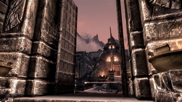 Skyrim: a city gate open, showing the inside of Windhelm.
