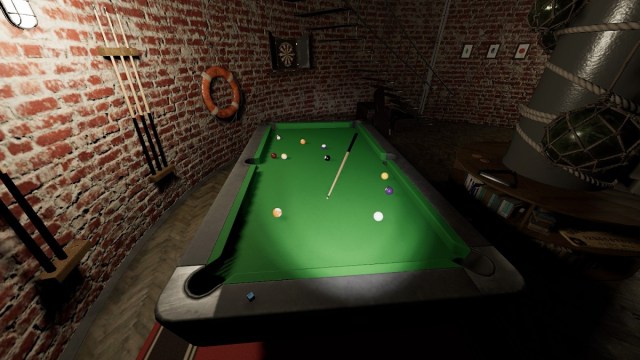 Phasmophobia: a flashlight shining on a pool table in Point Hope.
