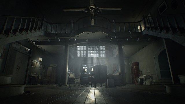 Resident Evil 7: a dark look at the Baker mansion entrance hallway.