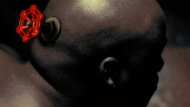 Valve: a literal valve embedded in the back of someone's bald head.
