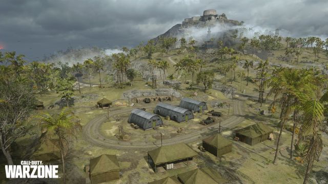Warzone's Caldera map, with army tents and trees.
