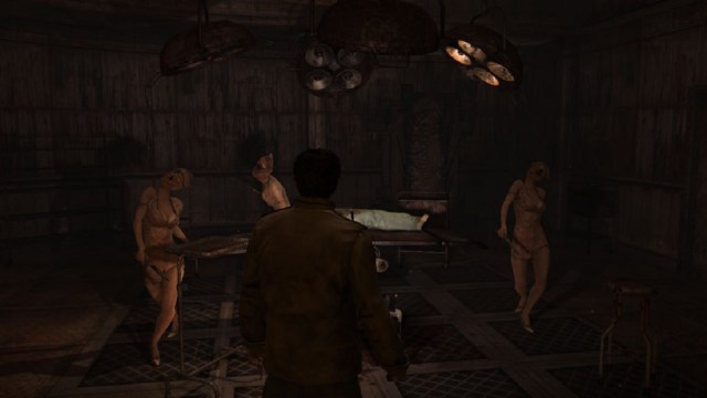 Silent Hill Homecoming: a male character stands in a dark operating room as three grotesque nurses advance on him.