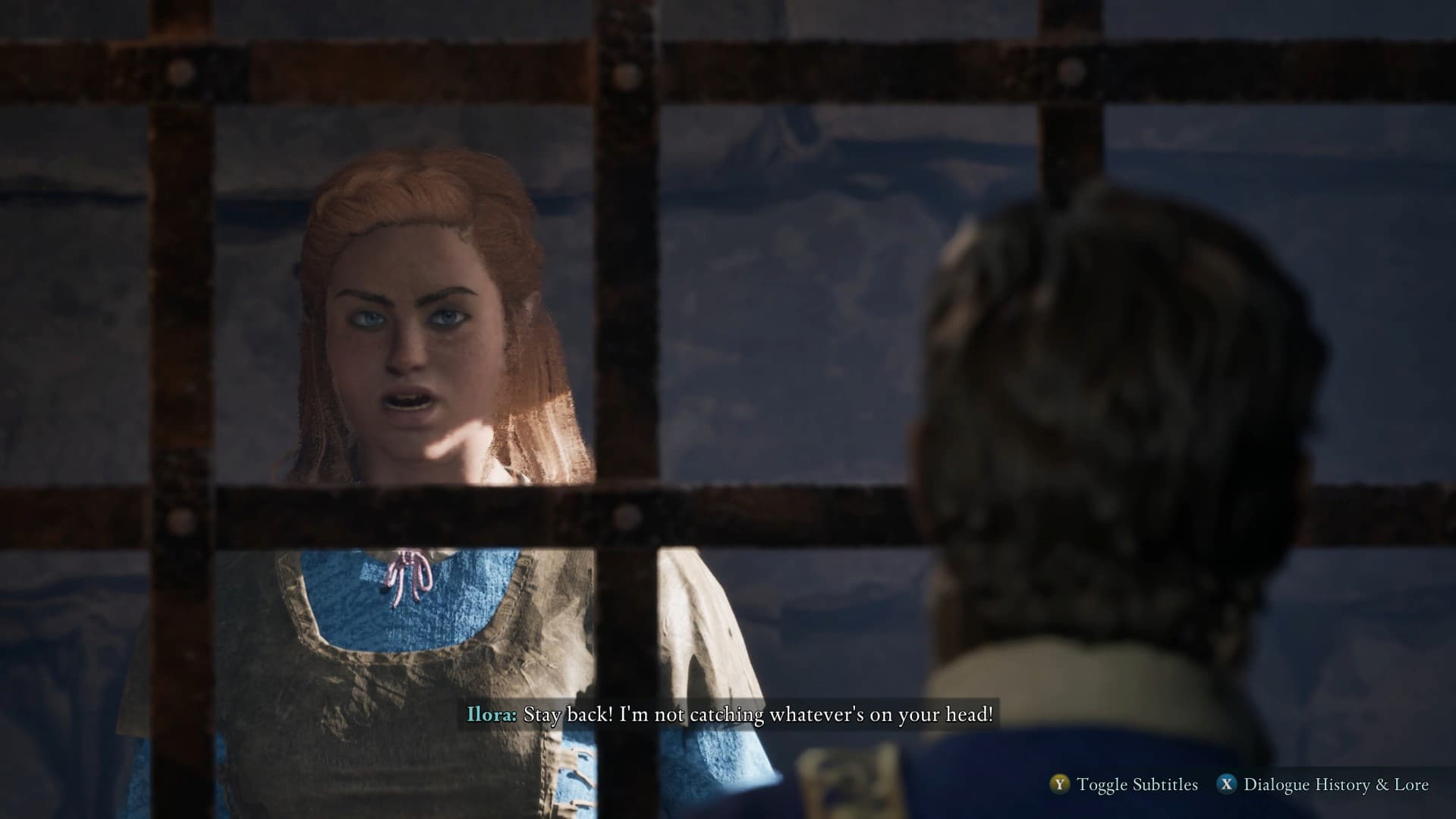 Ilora warning the Envoy to stay back in her prison cell in Avowed