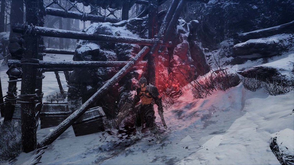 A Soulstone near a tower and a rock wall