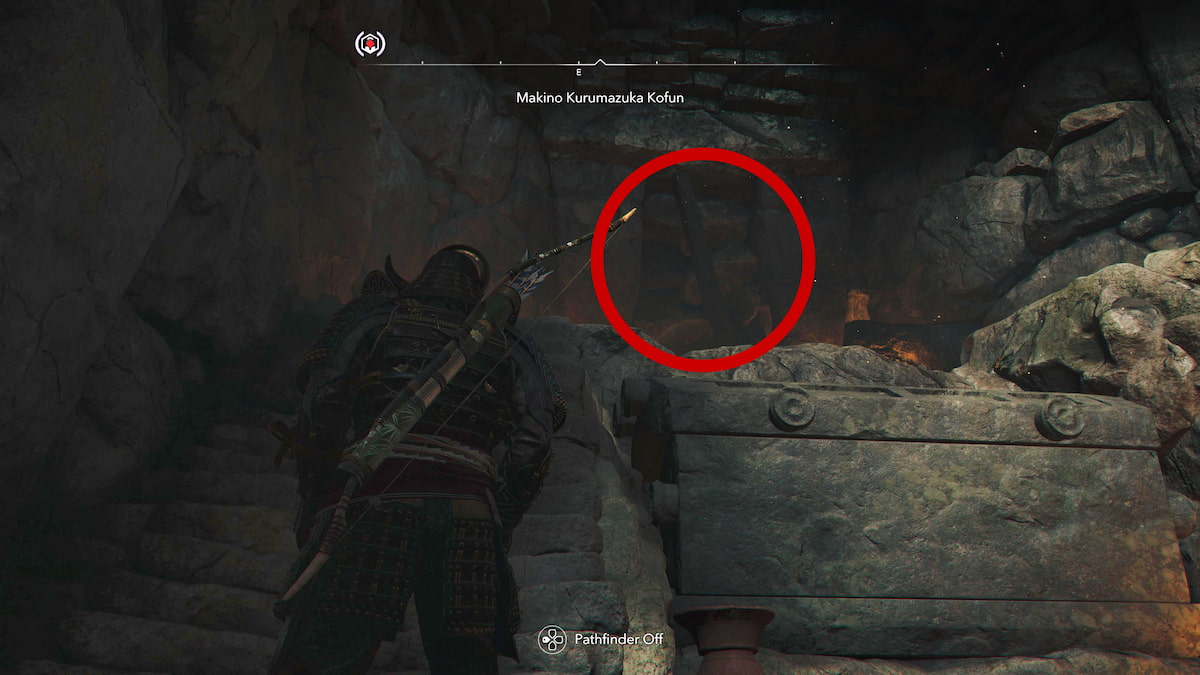 Yasuke carrying the explosive to rocky entrance