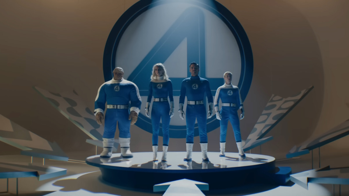 The Fantastic Four standing in front of a large blue four in Marvel's The Fantastic Four: First Steps film.
