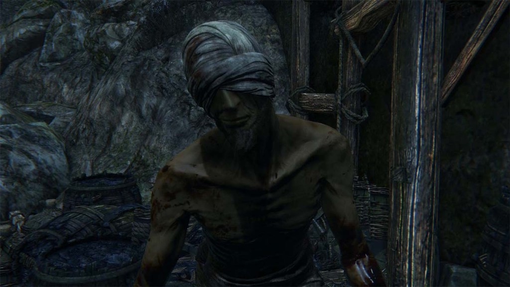 The afflicted beggar from Bloodborne, a skinny and blood-drenched man.