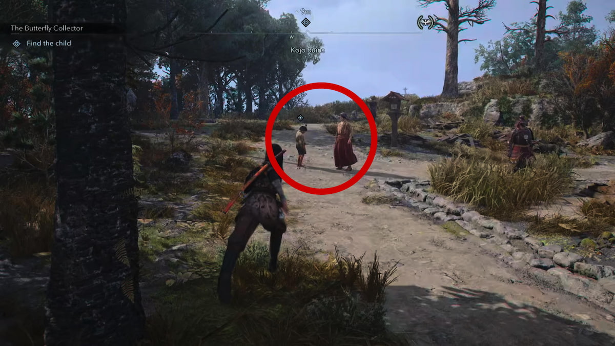 Mucho and child in Kojo Ruins