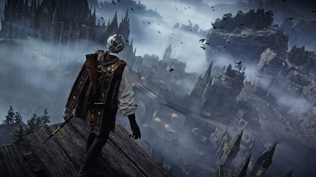A man with silver hair and a dark cloak stands on a wooden platform overlooking a castle surrounded by fog.