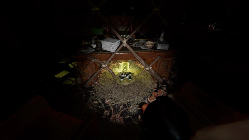 Forest Minion nest under a desk in Phasmophobia