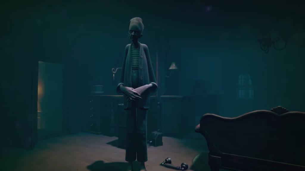 Full body shot of Mother Janna staring at Teddy