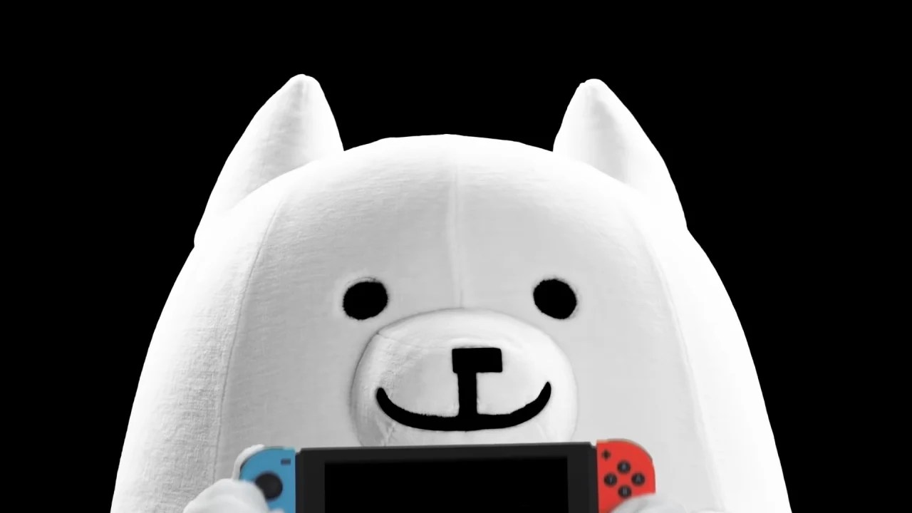 toby fox undertale dog holding a Nintendo switch