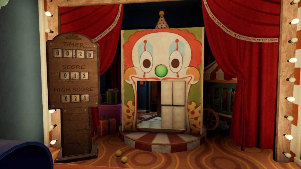 Red button and door behind Big Top Showroom clown game