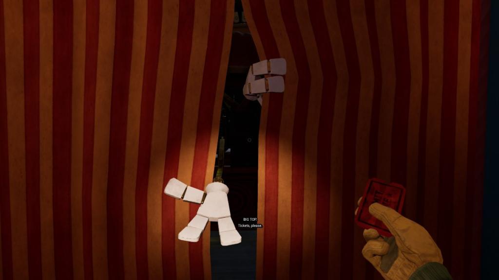 Big Top's hands coming through the curtains for a Theatre ticket