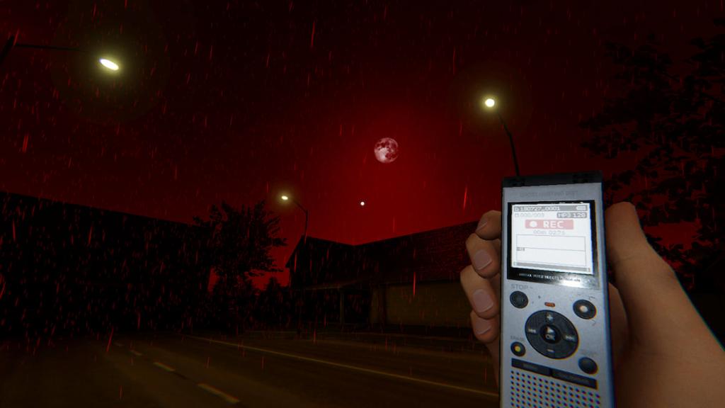 Holding a sound recorder outside in front of a red blood moon in phasmophobia