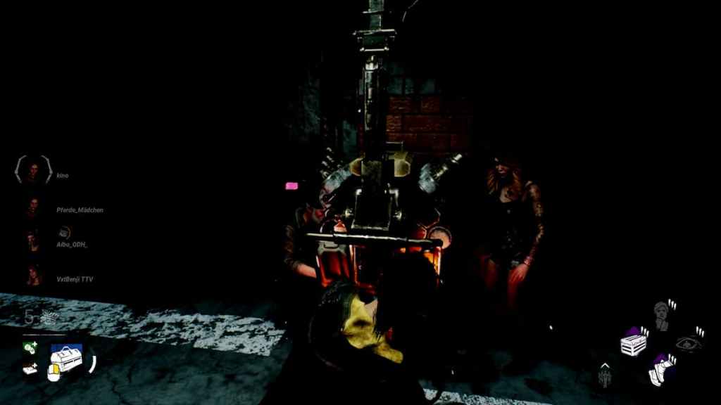 Three survivors working to fix a generator in Dead by Daylight. 