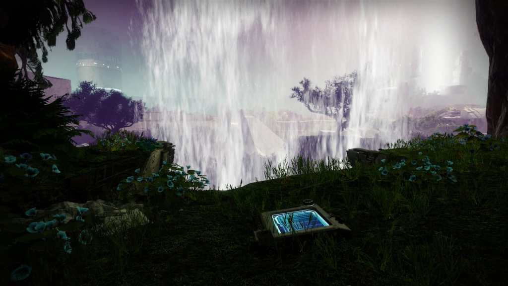 A data pad on a grassy section overlooking a waterfall.