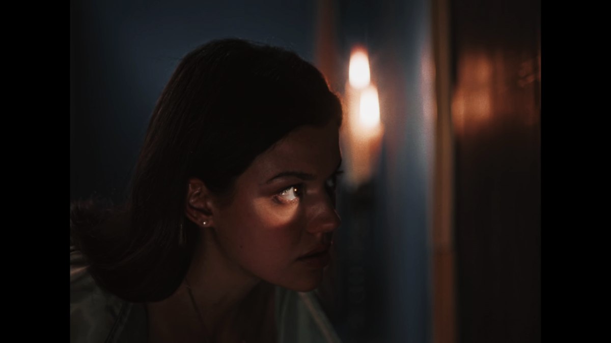 Profile shot of Ambrosio star peering through the lock hole