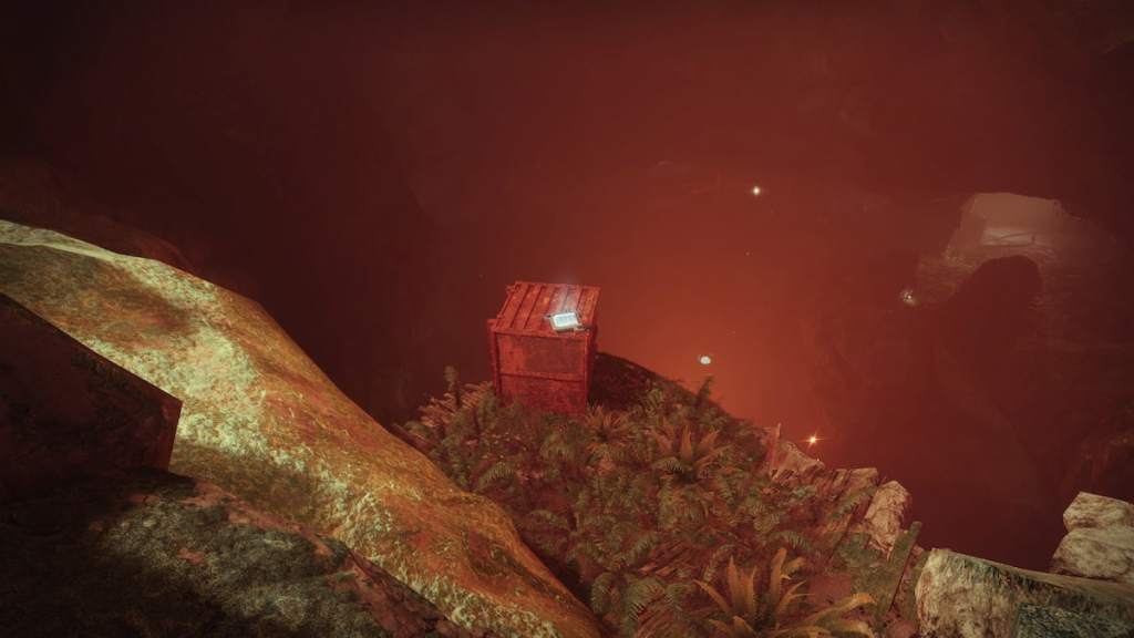 A data pad is visible on top of a rusted crate in the EDZ.