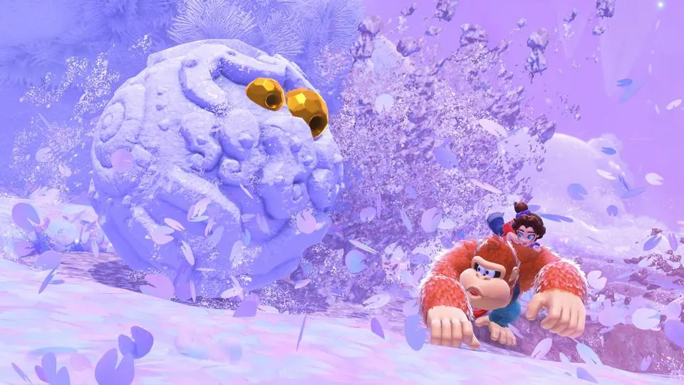donkey kong hitting a snow enemy in baananza