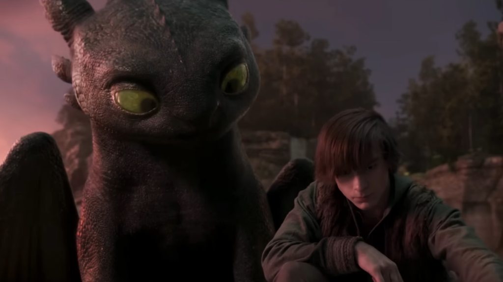 Toothless the dragon peering over Hiccup's shoulder in how to train your dragon
