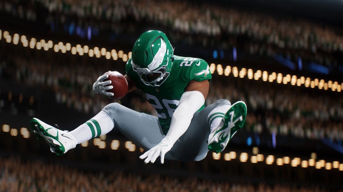 Barkley jumping in the air to score a touchdown in Madden 26