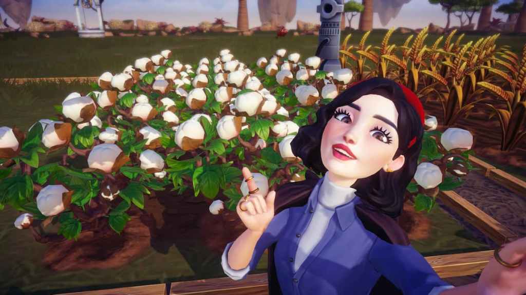 Pointing at some white cotton growing in disney dreamlight valley