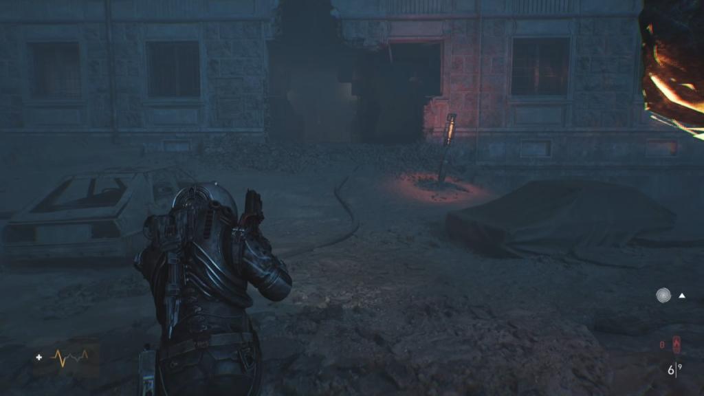 Walking to the Quarantined Building, accessible via a giant hole in its side with a Time Oddity next to it