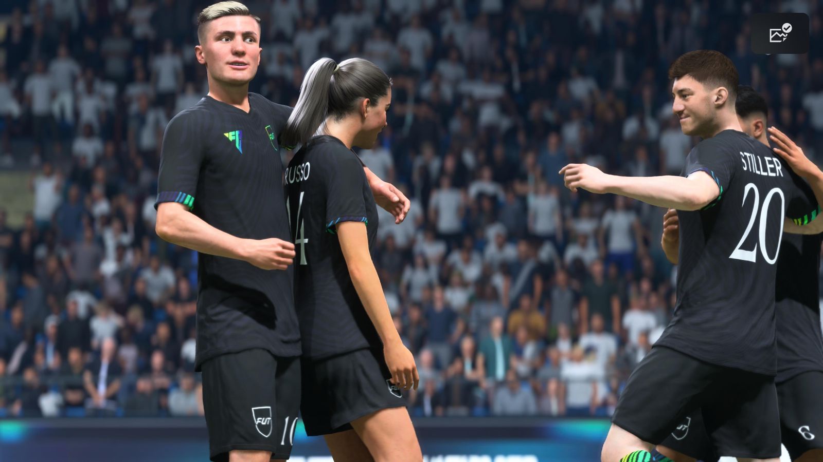 Players celebrating a goal in FC 26