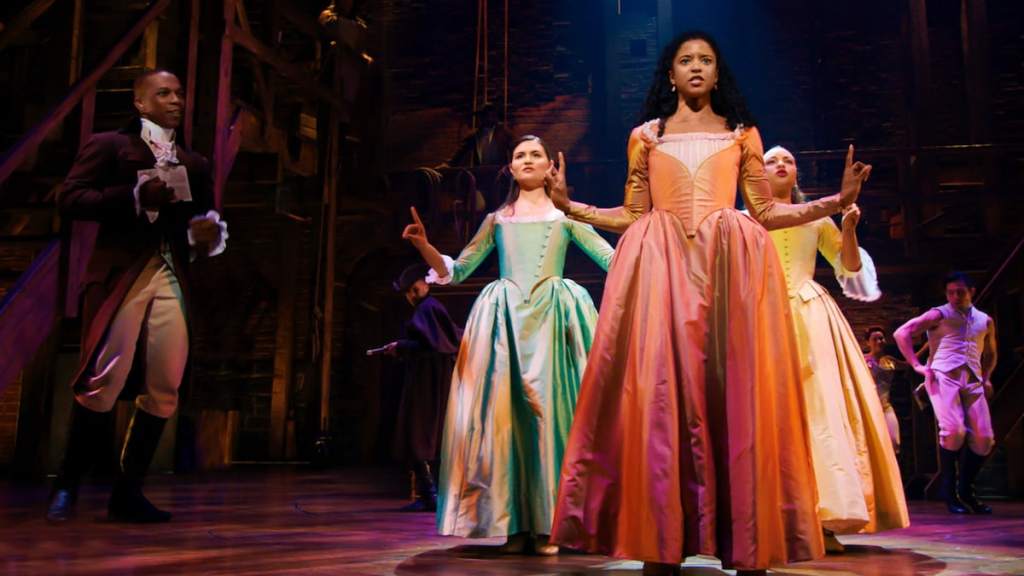 The Schuyler sisters dancing next to aaron burr in hamilton