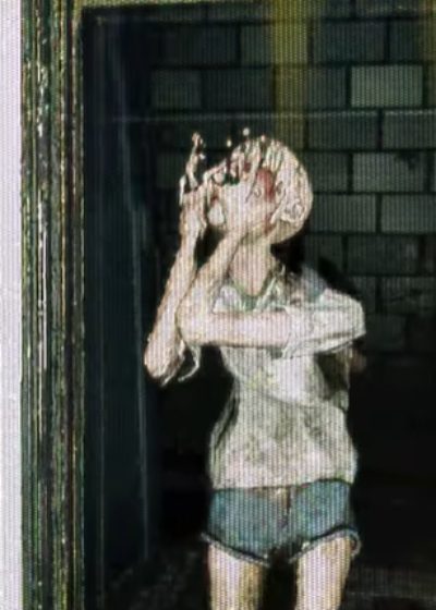 The entity hiding its face in agony