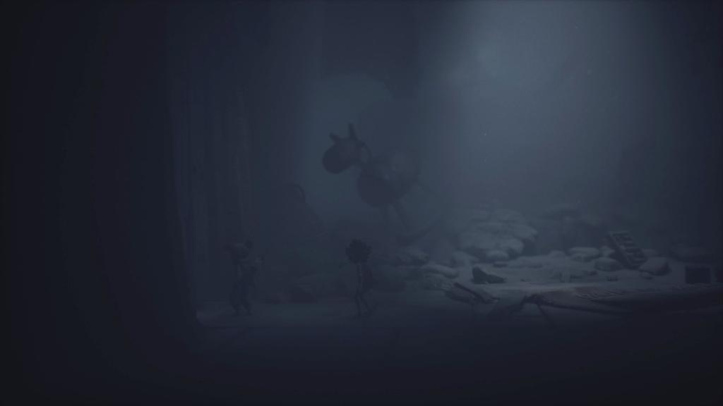 Going through a hole in the wall with a rocking horse visible in the background