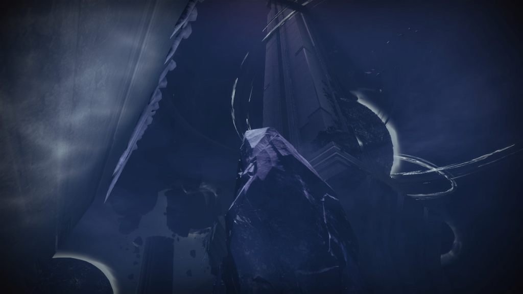 A floating glacier with a tall building behind it.