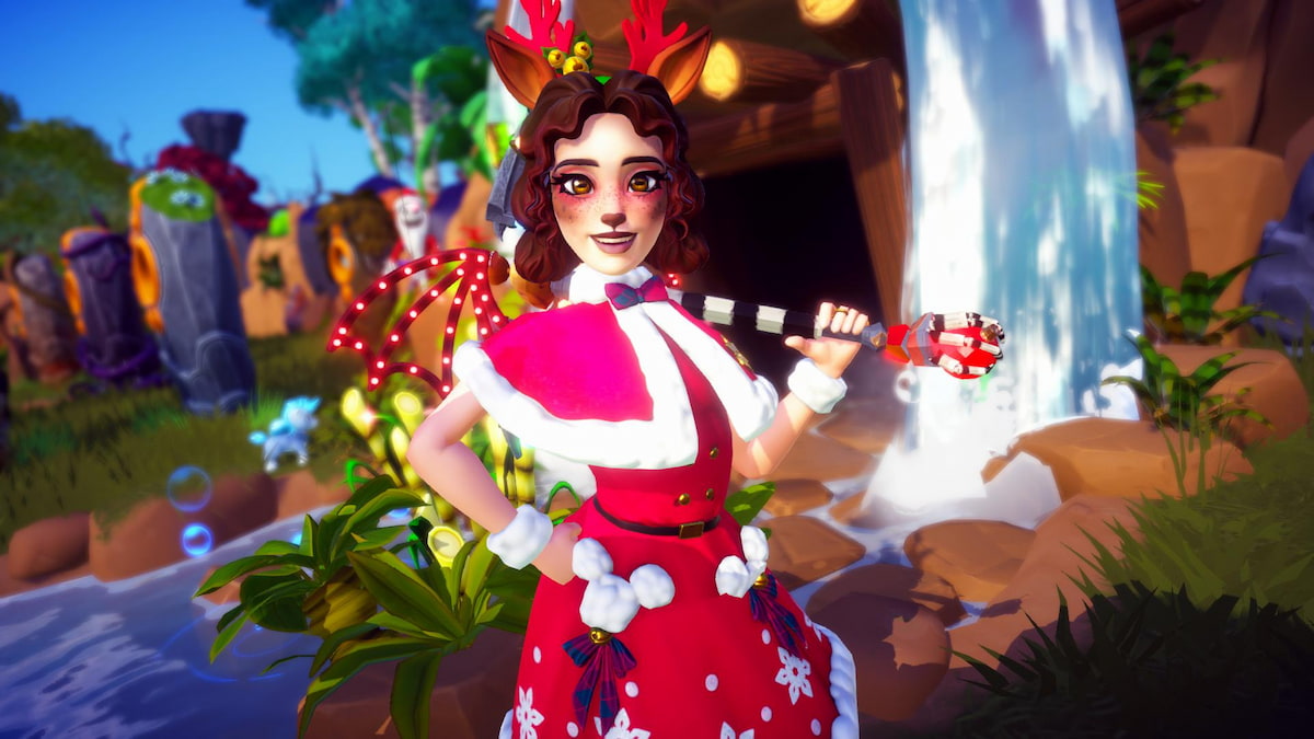 A player wearing a festive santa and reindeer outfit holding a pickaxe and smiling in disney dreamlight valley