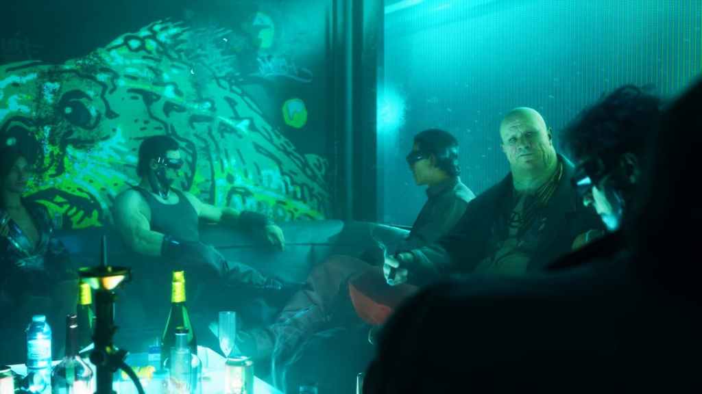 A bunch of criminals sitting in a neon lounge in No Law.