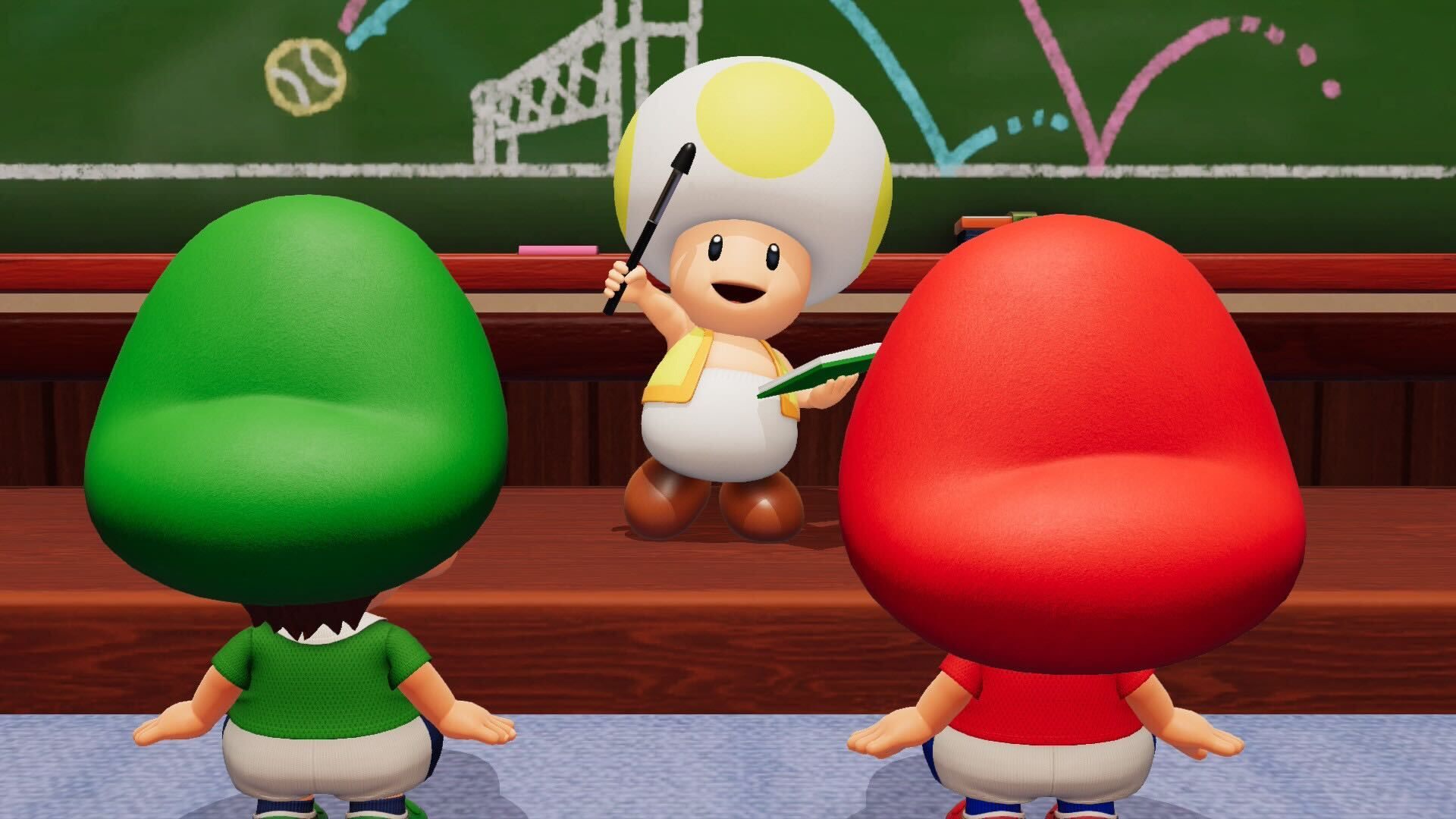 A screenshot from Mario Tennis Fever shows a yellow Toad raising a baton above his head while Baby Mario and Baby Luigi face him.