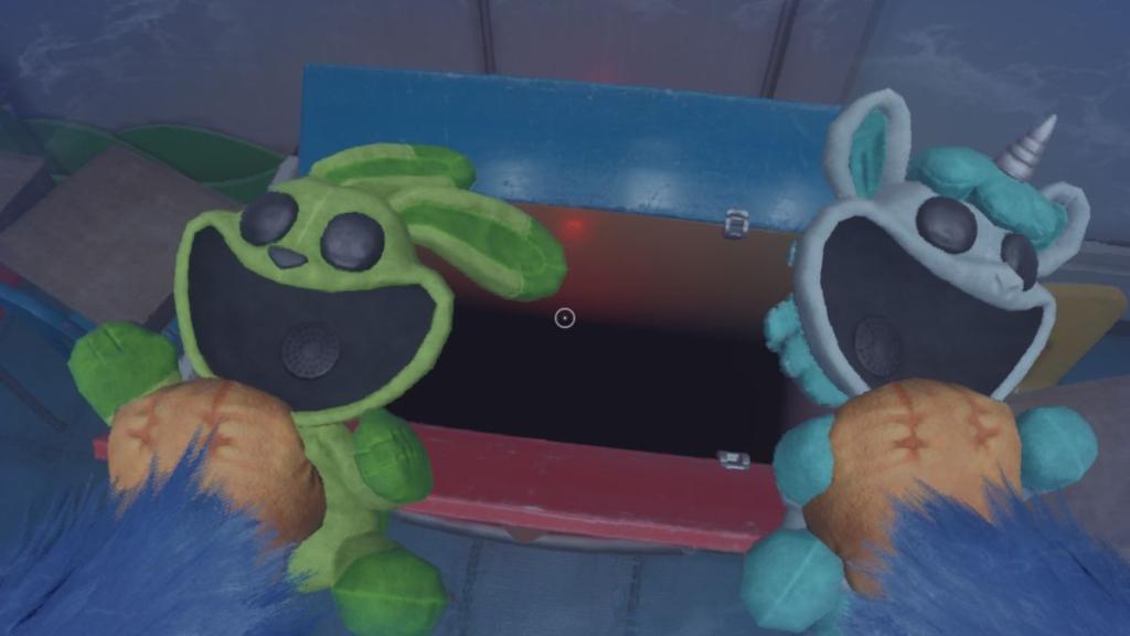 Holding two Critters over a toy box with a black hole inside