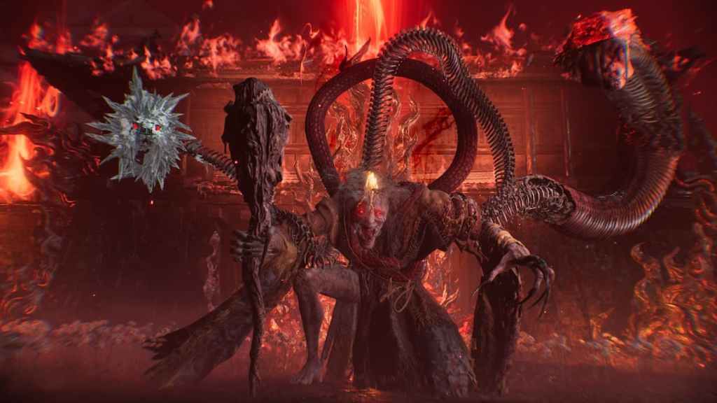 A demonic boss in front of a flaming castle in Nioh 3. 