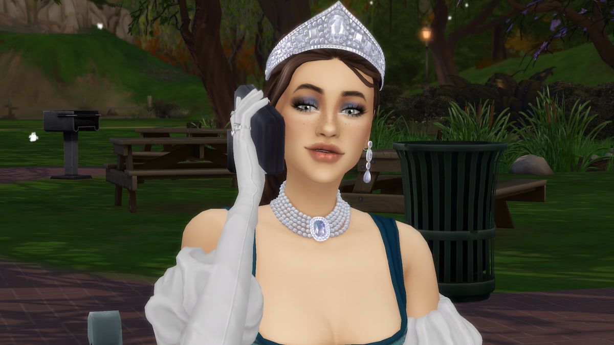 A sim with a shiny silver crown talking on the phone in the sims 4